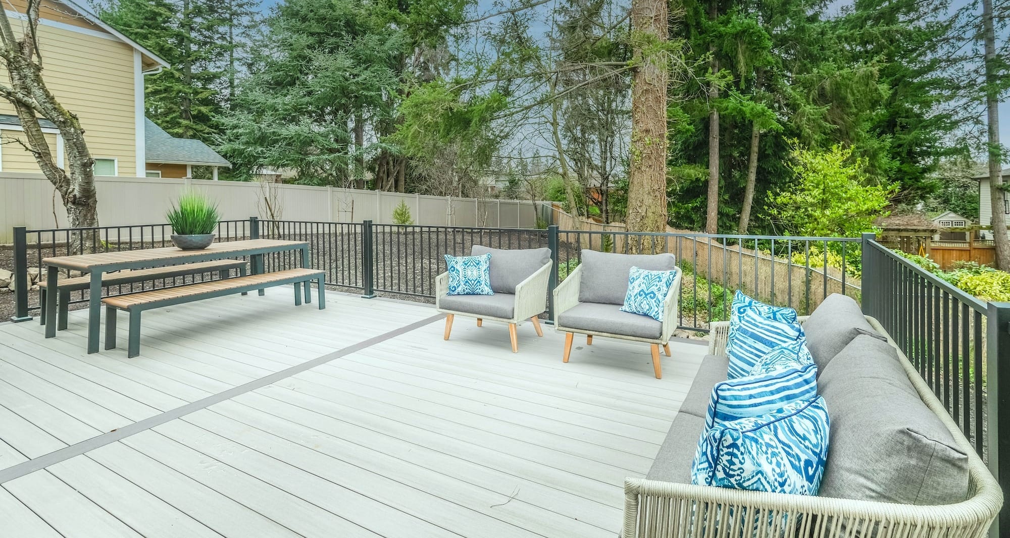 white wooden bench on wooden deck