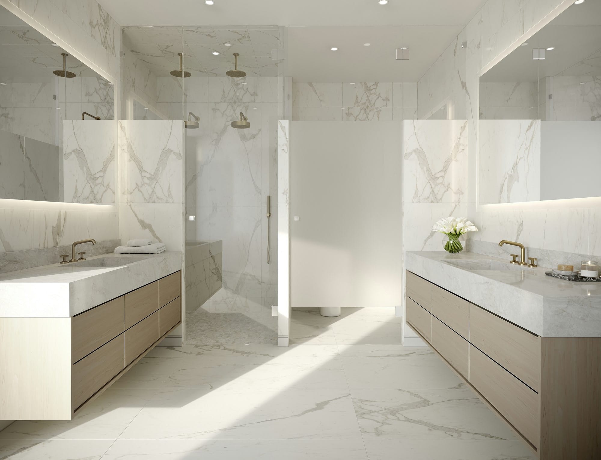 a large bathroom with marble counter tops and sinks