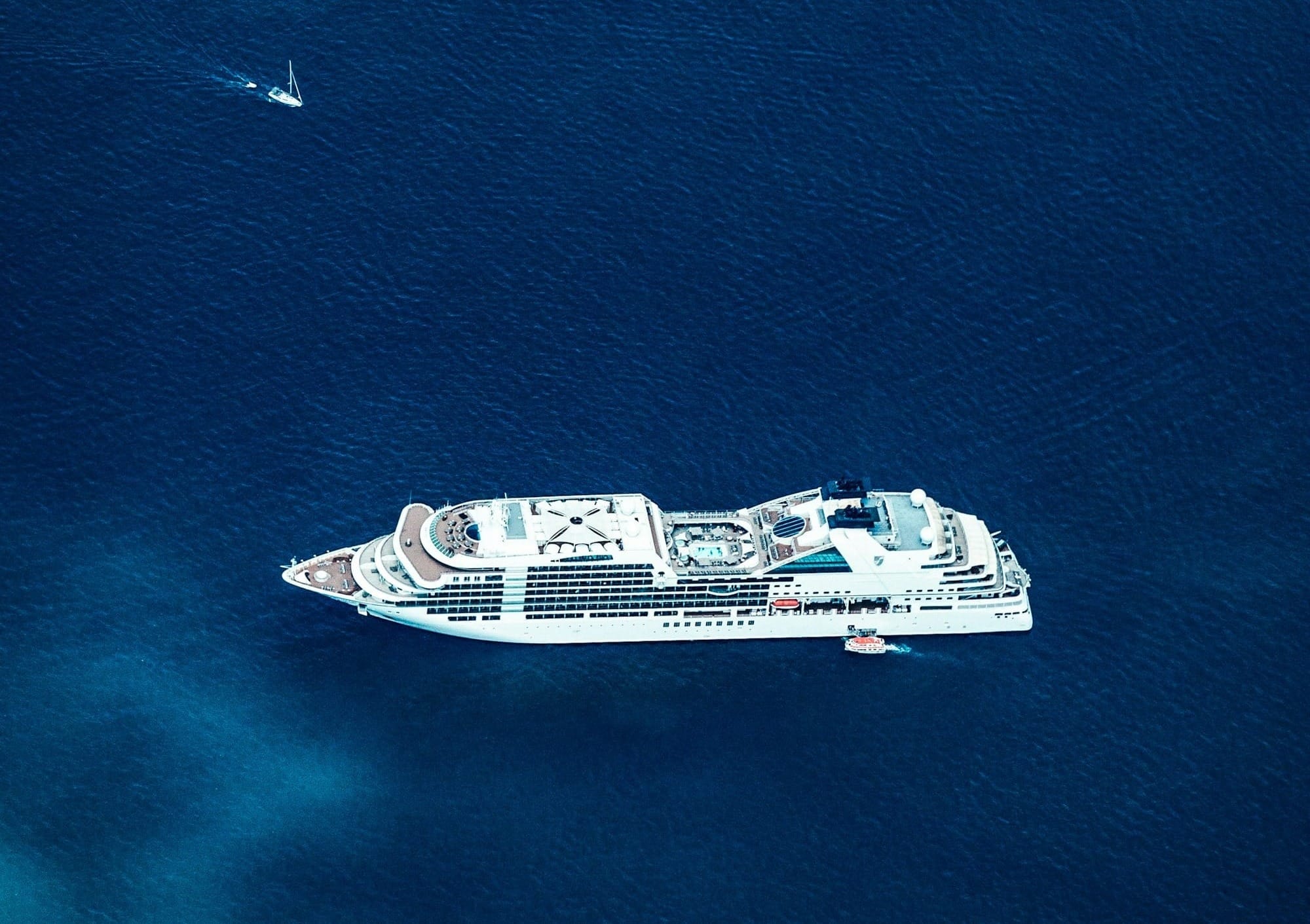 white and black ship on sea during daytime