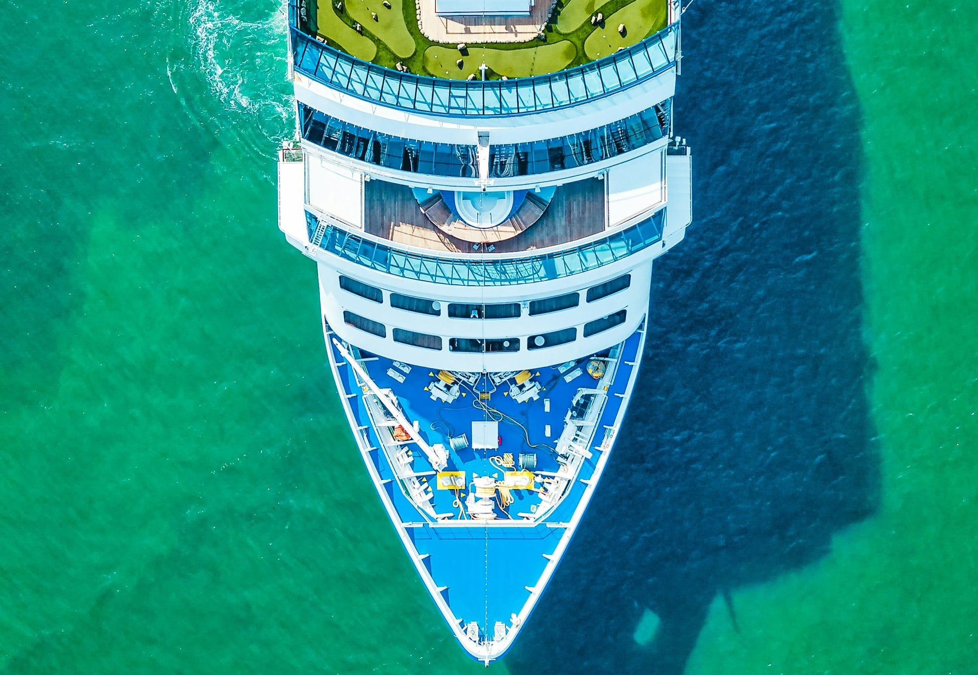 An aerial view of a cruise ship in the ocean